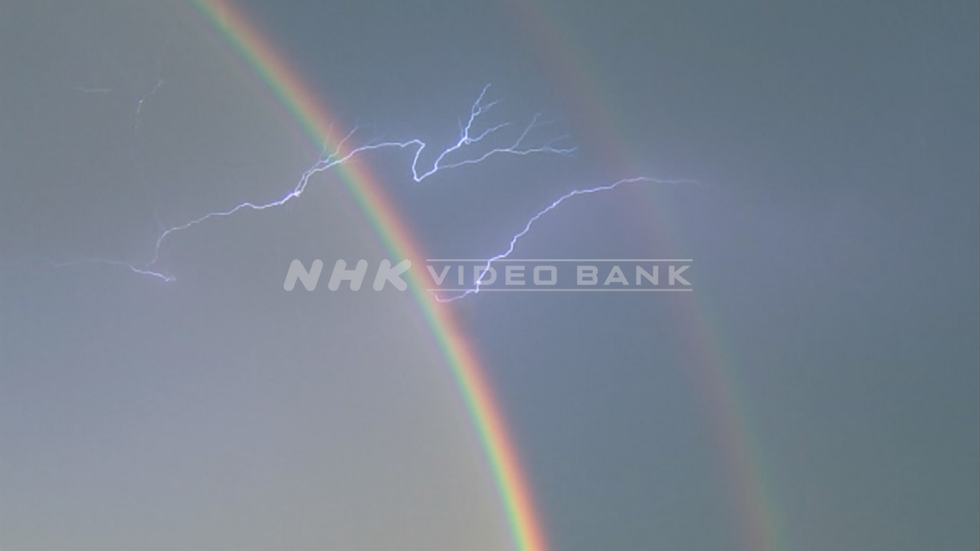Flash of lightning and rainbow